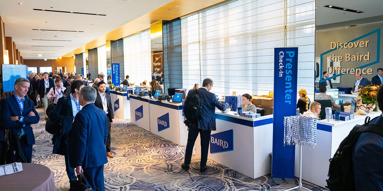 Attendees in the check-in area of a Liberty Conference